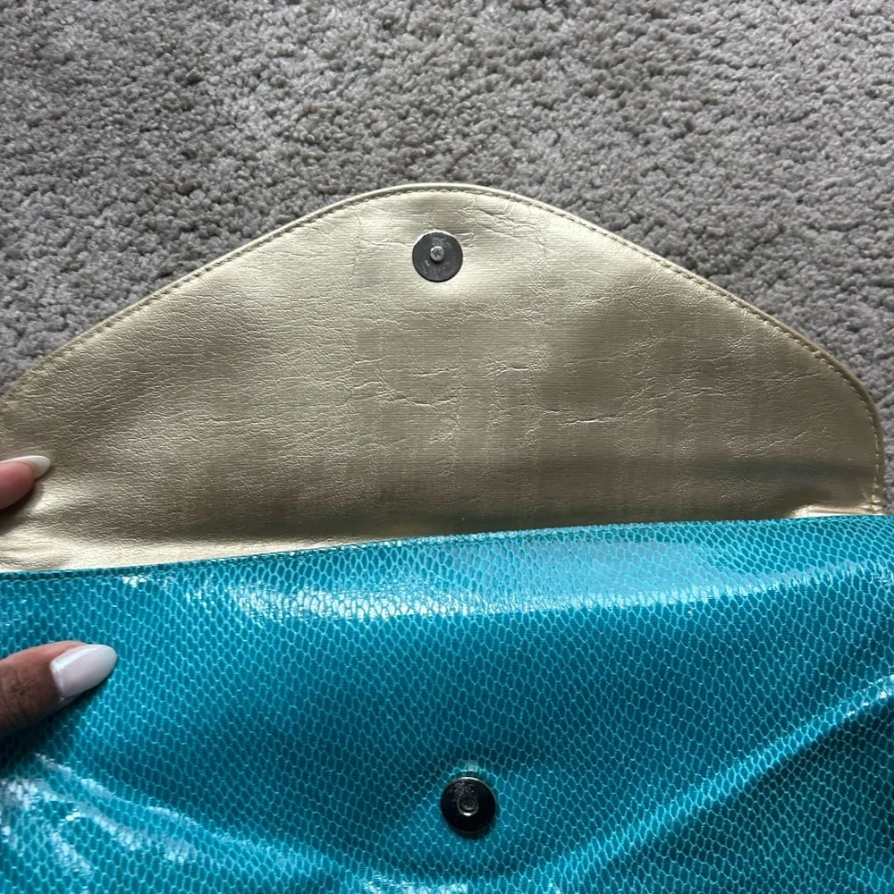 Kenneth Cole‎ Reaction Clutch